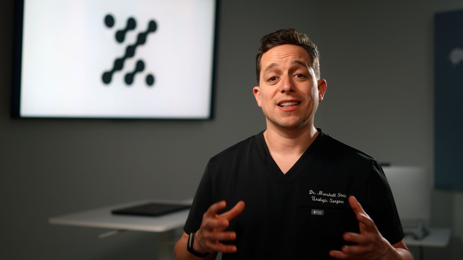 Dr. Marshall Stein speaking to camera in the clinic